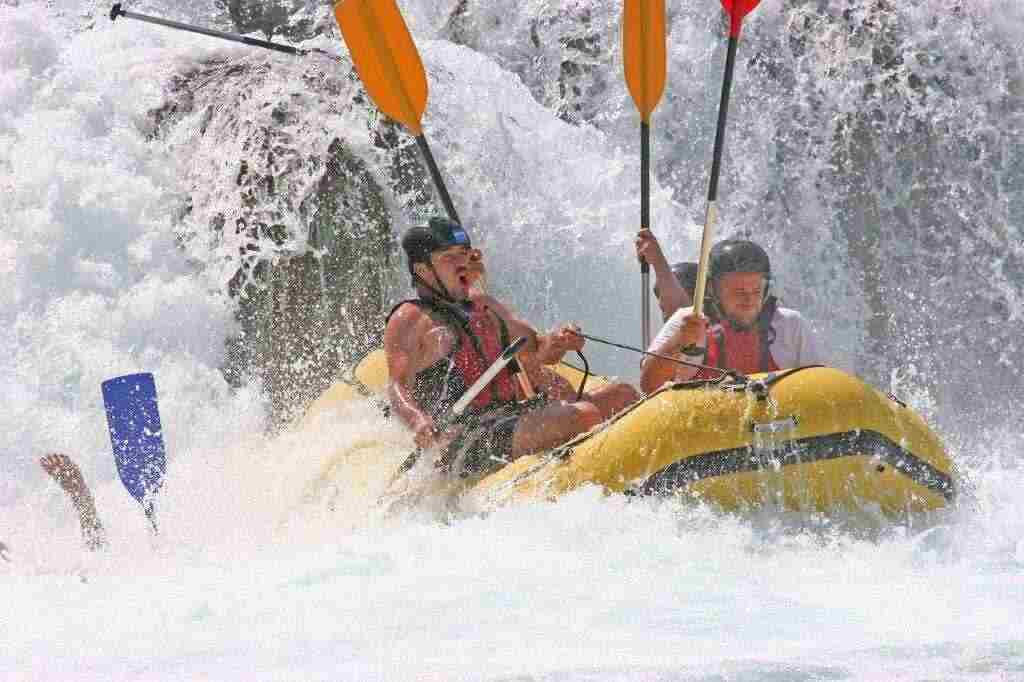 A group doing extreme rafting.