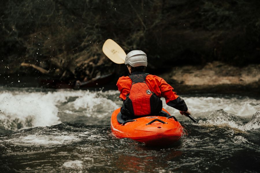 A person doing Solo rafting.