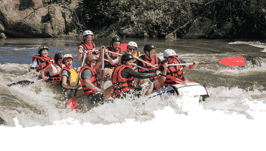 People doing rafting in some rapids.